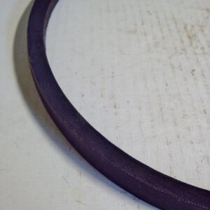 A close up of the side of a plain V belt
