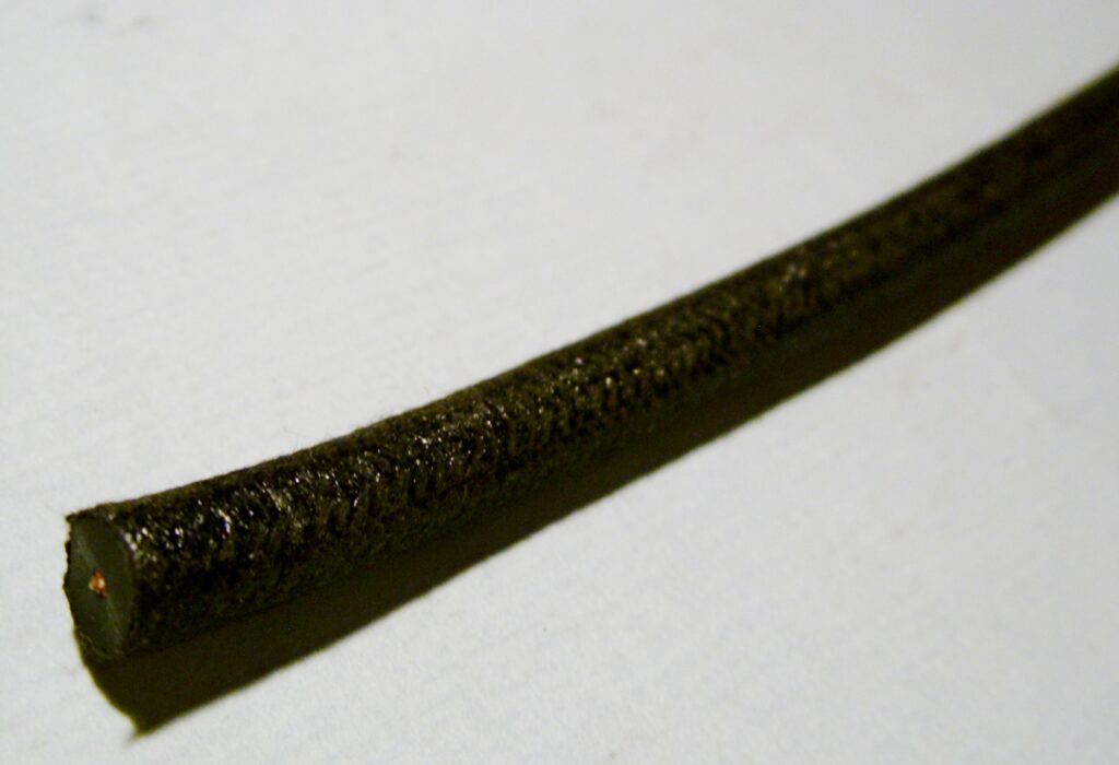A close up of satin black spark plug wire