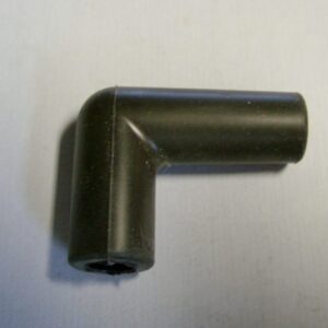 A black plastic Right angle spark plug wire boot on a white surface.