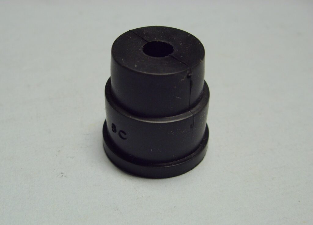 A black rubber ignition coil boot