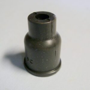 A reproduction straight distributor cap boot with a hole in it.