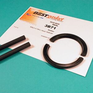 A set of black rubber rings and a piece of paper.