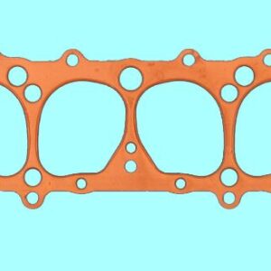 An orange cylinder head gasket on a blue background.