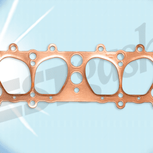 A copper cylinder head gasket on a blue background.