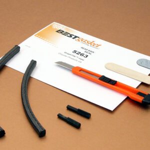 A tool kit with a pair of scissors and a piece of paper.