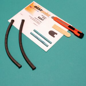 A set of tools and a piece of paper on a table.