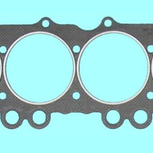 A cylinder head gasket on a blue background.