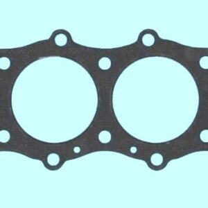 A cylinder head gasket on a blue background.
