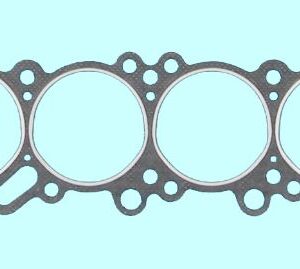 A set of cylinder head gaskets on a white background.