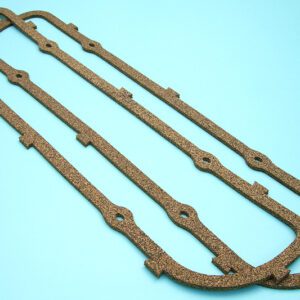 A pair of 1963-67 Cadillac V8 390, 429 valve cover gaskets on a blue background.