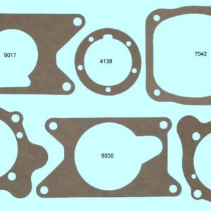 A set of Late 1935-38 Pontiac transmission gaskets and gaskets.