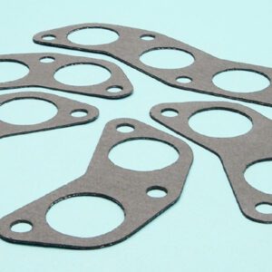 A set of gaskets on a blue surface.
