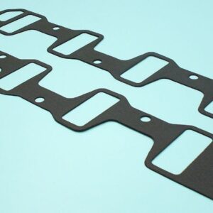 Two black gaskets on a blue background.