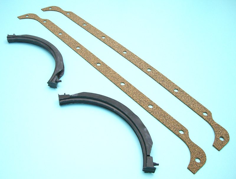 A set of rubber gaskets on a blue surface.