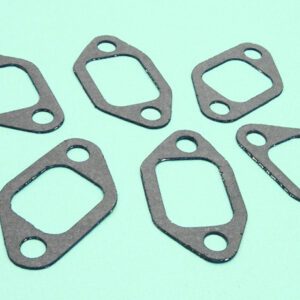 A set of gaskets on a green background.