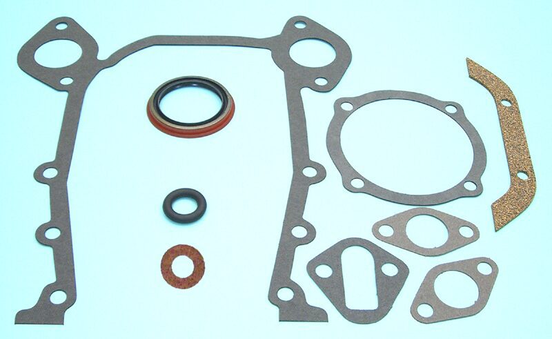 A 1957-66 AMC, 1965-71 Willys timing cover gasket set with seals and gaskets on a blue background.